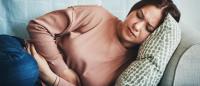 Woman with abdomen pain 女性腹部疼痛